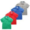 Polos pojkar flickor polo skjorta sommar barnkläder t-shirts mode bomull kort ärm spädbarn godis 8 färger för barn camisetas 230628