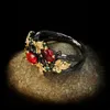 Med sidorstenar utsökt bladblomma färg zirkon ladie s ring smycken svart guld två färg röd 230629