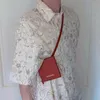 Kvinnor BLOUSES 2023 Högkvalitativt märke Kawaii Beach Hawaiian Button Up Shirt Floral Japan Blus For Men Loose Short Sleeve Women Tops