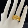 2024 Marque de luxe Designer Lettre Bague creuse pour femmes Bague d'ouverture en or pour hommes Bague d'engagement de mariage pour couple Bague de fiançailles Meilleure qualité