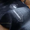 Autumn Men's Jeans Men denim rakt slitna europeiska och amerikanska klassiska långa varumärkesmodebyxor