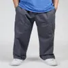 Летние мужские брюки большого размера XXXL 5XL 6XL, обычные брюки-карго на молнии, брендовые новые мужские толстые повседневные карманы, мешковатые мужские свободные Cott340D