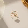 Diseñador de joyería Vintage 4/cuatro trébol anillo flor clásica anillos de boda de mujer hombre amor fiesta regalo