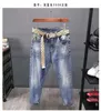 Herr jeans designer high end vår och sommar nya jeans mäns lös mångsidig trend smala fitt byxor brev broderi koreanska beskuren u3o2