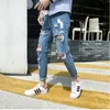 Men S Jeans Hurtowa wiosenna jesień Zagniona duża dziura dżins mężczyźni nastolatki szczupłe koreańskie zeskrobane żebrakowe spodnie cienkie 230629