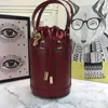 Designer Bag Mens and Womens Mini Leather Bucket Bag 637115 Mode Portable Tote Drawstring Crossbody Bag Temperament Wallet Card Bag