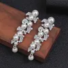 Boucles d'oreilles exagérées de charme perle accessoires de mariée de mode long alliage galvanoplastie 230630
