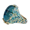 Klusterringar eleganta kvinnor mode guld färg snidning emaljblomma för kreativitet inlagd blå sten förlovningsring smycken 230630