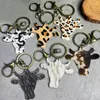 Nyckelringar äkta läder Leopardko huvud Keychain Western Key Fob Chains Ring Bag Charm Vintage smycken grossist