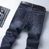 Designer de jeans pour hommes marque de mode de Hong Kong haut de gamme jean bleu délavé européen hommes dans un pantalon décontracté mince et droit épais WO2F