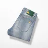 Jeans Masculino Designer Primavera/Verão Edição Coreana Pé Pequeno Elástico Ajuste Slim Fit Calça Monstro de Marca Europeia de Alta Qualidade RQN9