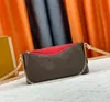 Designväskor kvinnor lyxiga plånbok bokstäver zippy plånböcker axelpåsar bärbara damer långa kopplingspåsar blixtlås mynt pursar palls cluth handväskor crossbody