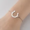 Bracelet pour femme en forme de fer à cheval en forme de U de mode européenne et américaine INS Sens du design pour femme Petite et simple personnalité Bracelet animal