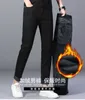 Мужские джинсы дизайнерские Осенние и зимние плюшевые утолщенные новые джинсы Легкая роскошная корейская версия Толстые эластичные ножки Slim fit с вышивкой