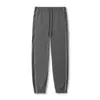 Męskie spodnie czarne luźne menu casual men joggers na siłownię fitness dresowe sporty Szybkie suche spodnie Męskie Trening Sportswear Bottoms