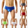 Cuecas sexy homens briefs óleo brilhante calcinha bulge bolsa baixa ascensão roupa interior alta elástica unisex secagem rápida calcinha biquíni