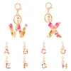 Anahtarlık moda kuru çiçek mektubu anahtarlık kolye 26 baş harfleri kızlar için anahtarlar anahtar çanta el çantası sırt çantası araba aksesuarları