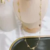 Mode kvinnor 18k guldpläterad rostfritt stål halsband designer halsband choker brev hänge kedja kristall kubik zirkoniume weddi221u