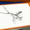 Nieuwe hoogwaardige heren- en damessieraden vliegtuigen brief hanger ketting mode feest vakantie cadeau accessoires294V