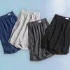 Cuecas de tecido de seda de gelo shorts tamanho grande macio respirável sono masculino com cintura elástica acima do joelho oco