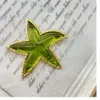 "Ocean Star"에서 고대 빈티지 중공업은 Sea Star Brooch 손 구운 유리를 과장합니다. 단순하고 세련됩니다.