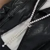 Chaînes Zi You Bijoux de mode pour femmes Micro Incrusté Zircon Accessoires Collier de perles d'eau douce Pendentif Gland Longue chaîne de pull