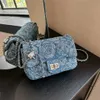 Korean version of Chain 2023 Early Autumn New Women's Versatile Denim Shoulder Foreign Flower Crossbody Bag model 7569