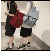 Школьные сумки. Стильный нейлоновый студенческий рюкзак: многофункциональный, прочный, с откидным шнурком.
