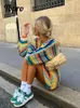 Kobiety dla kobiet Kolkowe pasiaste damki na dzianina moda Modna Rainbow Kolor swetra długiego rękawu płaszcze jesień żeńska swetry streetwearu 230928