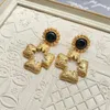 Boucles d'oreilles médiévales creuses en forme de tournesol, plaquées or, croix noire française, luxe