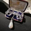 Broches Vintage avec nœud papillon pour femmes, accessoires de vêtement incrustés à la main en Zircon et en perles