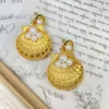 Small group of ancient vintage gold plated shell pearl earrings marked in 'Gravel into Pearl'