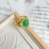 Anello artistico ed elegante in stile vintage regolabile verde smeraldo con taglio aperto