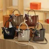 Zimu Bucket 2023 New Women's Texture Decorty Decoration Simple Handheld One Counter Crossbody Bag Model 4239