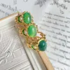 Anello artistico ed elegante in stile vintage regolabile verde smeraldo con taglio aperto