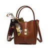 Zimu Bucket 2023 New Women's Texture Decorty Decoration Simple Handheld One Counter Crossbody Bag Model 4239