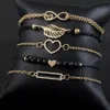 Pcs / Set Amor Coração Símbolo Infinito Charme Pulseiras Para Mulher Link De Ouro Cadeia Oca Pena Preta Grânulos Braclet Girl335E