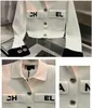 Designer women's high quality polo knit sweaters fashion short length letter embroidery long-sleeved shirt jacket small fragrant jacket black and white top clothes