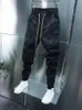 Męskie dżinsy czarne dżinsy chude haremowe spodnie na zewnątrz Slimline Jogger Drespants list drukujący wysokiej jakości marka streetwear odzież 231003