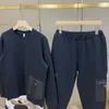 2023SS Abbigliamento sportivo in cotone da uomo nuovo Triangolo Decorazione Designer Due pezzi Set da jogging Pantaloni da uomo Set Taglia cinese M-3XL