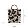 TOTES kadın moda trend retro tasarım inek desen doğal bambu tutamak çanta büyük kapasite pu kadın kova çantası gündelik tote çanta 240407
