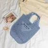 Totes Women's Summer Beach Wauction Fashion Pagning Knitting Bulle Borse Luxury Hollow Out Borse portatile Porta di grande capacità TOTE Casual 240407