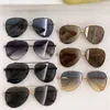 Diseñador Gafas de sol Gafas de sol de moda Mujeres Hombres Gafas de sol Gafas Adumbral 7 Opción de color Anteojos Playa Al aire libre Alta calidad con caja GG1594