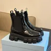 Botas de diseñador famosas Botas cortas gruesas para mujer Botines con punta redonda Botas de motociclista de invierno Botas de cuero Botas Martin Tacón bajo Zapatos planos de lujo de alta calidad