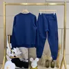 2023SS Abbigliamento sportivo in cotone da uomo nuovo Triangolo Decorazione Designer Due pezzi Set da jogging Pantaloni da uomo Set Taglia cinese M-3XL