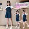 Ensembles de vêtements Summer Girls Casual Set Coton Mode Moyen et Grands garçons Version coréenne Style étranger Denim Strap Pantalon T-shirt