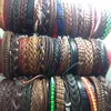 Pulseiras inteiras de couro genuíno para homens e mulheres, 100 peças, vintage, punho de surfista, presente de festa, estilo misto, joias da moda, lotes286s