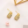 Designer Lock Boucles d'oreilles Collier Bijoux Femmes Ne se fanent jamais Cristal, Strass Plaqué Or 18 Carats Pendentif Cuivre À La Mode Femmes Amoureux De Mariage Cadeau