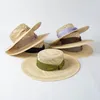 Chapeaux larges chapeaux de luxe design chapeau de paille mode loisirs creux ruban tressé à la main arc grand avant-toit plat élégance extérieure parasol