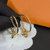 Boucles d'oreilles de créateur plaquées or 18 carats pour femmes Circle Charm Marque Lettre Cadeau Cercle Pendentif Boucles d'oreilles Cuivre Non Fading Bijoux de haute qualité Boucle d'oreille de luxe Y23354